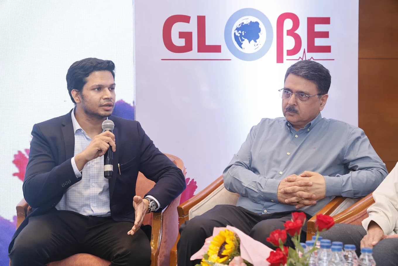 Dr. Pawan Goel speaking on a panel at a medical event